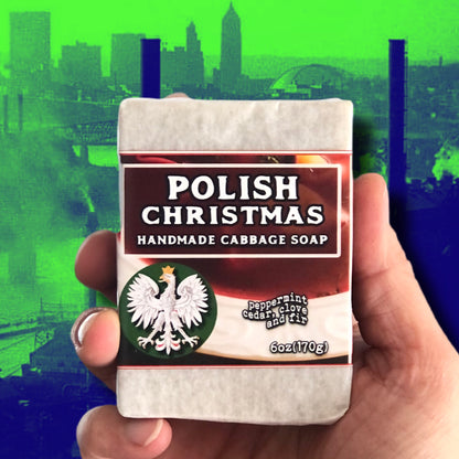 a hand holds a bar of polish christmas gift soap with a polish falcon